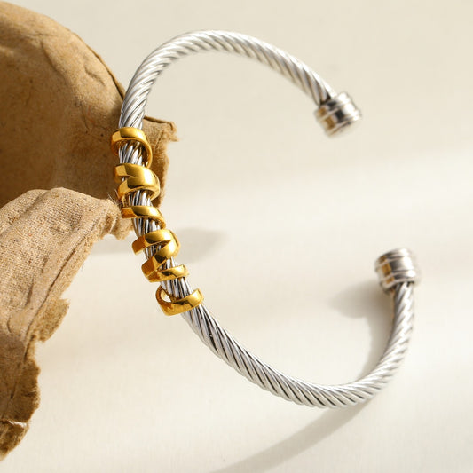 SUTRA TWIST BANGLE